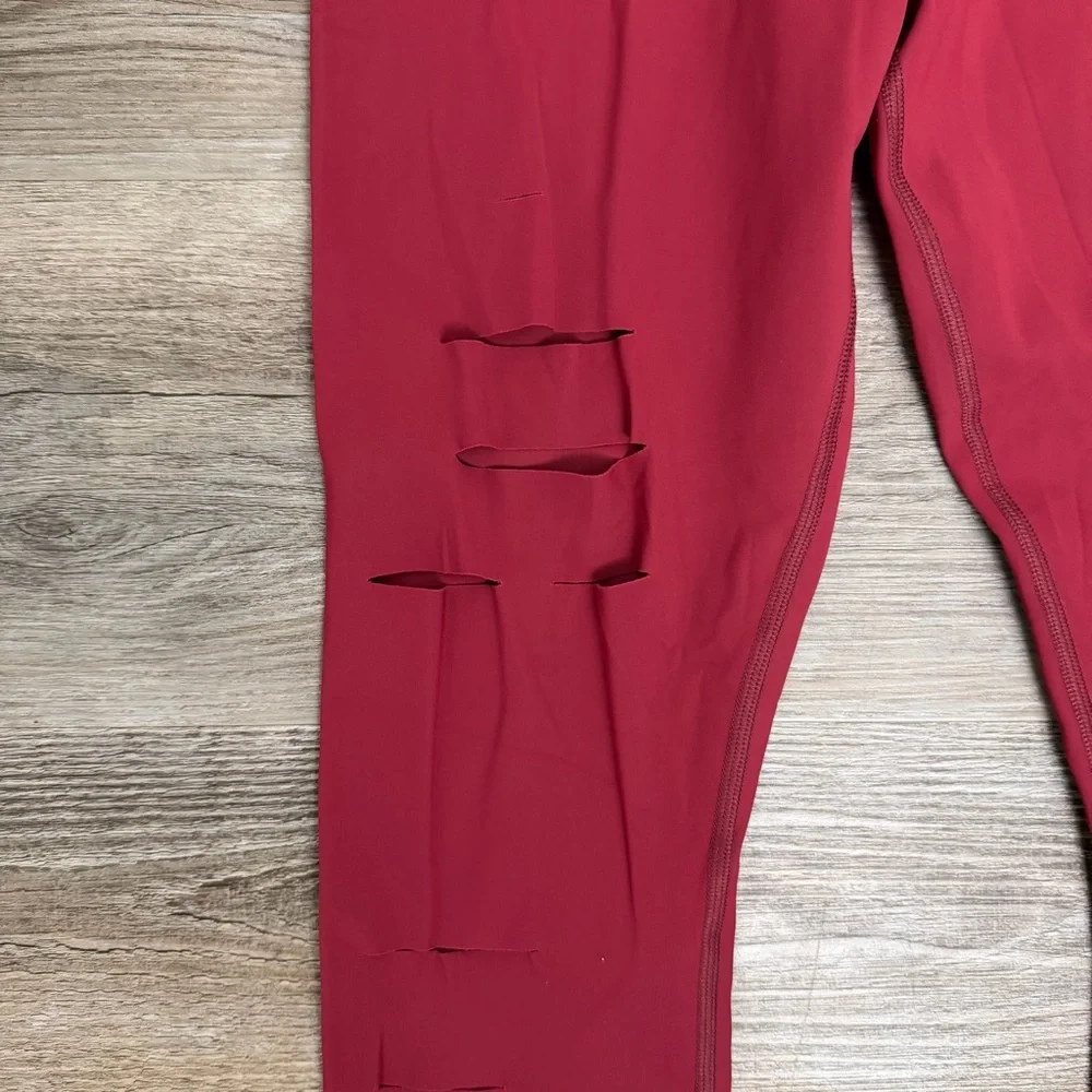 Alo Yoga High Waisted Ripped Warrior Leggings in Red-size Medium *NEW w/o tags*